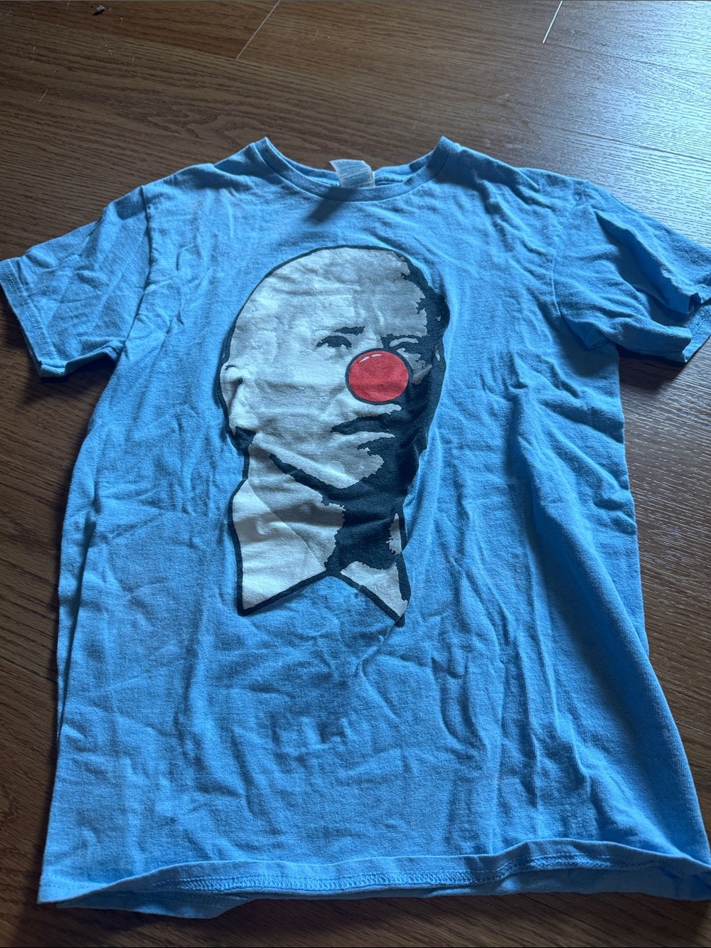 Delta Light Blue Short-Sleeve Tee with Red Nose Graphic